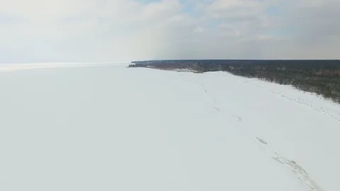 4K Aerial. Fly over winter   frozen lake or sea. 스톡 동영상 88979752