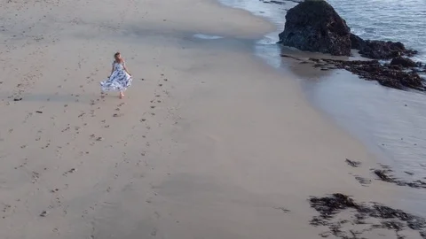 4k Aerial Flying Above Beautiful Woman Running On The Beach &amp; Ocean 스톡 동영상 80986809