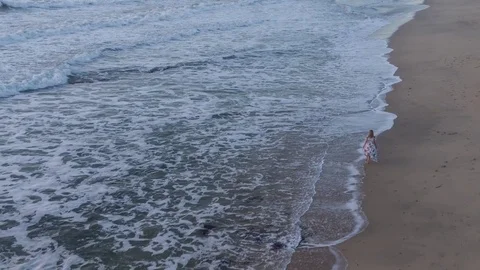 4k Aerial Flying Above Beautiful Woman Running On The Beach &amp; Ocean Stock Footage 80987932