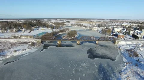 4k aerial flying over train bridge winter time Stock Footage 58855722
