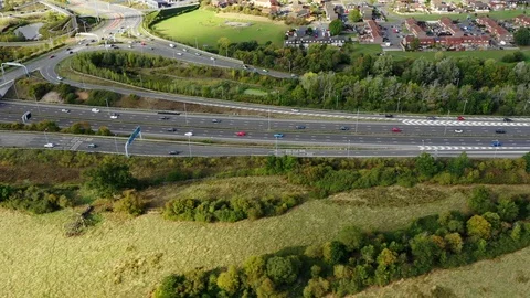 4k aerial footage sideways parallel alongside the M4 motorway, UK Stock Footage 95634911