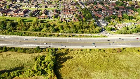 4k aerial footage sideways parallel alongside the M4 motorway, UK Stock Footage 95645040