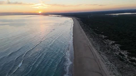 4K Aerial: Forward drone flight along Enebrales beach coastline in Huelva. Stock Footage 333637637