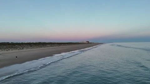4K Aerial: Forward flight over empty Enebrales beach at twilight blue hour. Stock Footage 333637655