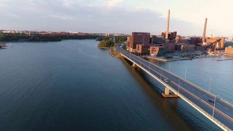 4K Aerial forward flying warm yellow and blue scene with, sea, bridge, cars Stock Footage 78777778
