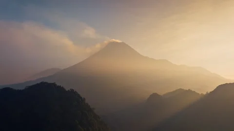 4K Aerial hyperlapse flying to mount Merapi volcano at sunrise, Java, Indonesia Stock Footage 245564928