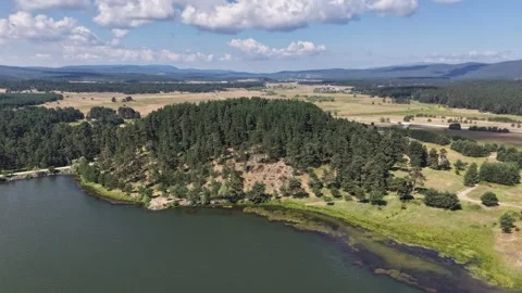 4K aerial hyperlapse video of a serene lake Stock-Footage 340469987