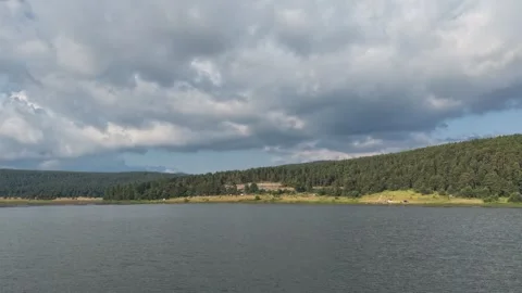4K aerial hyperlapse video of a tranquil lake Stock Footage 340470209
