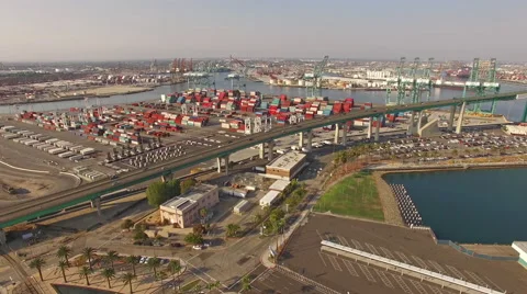 4K Aerial Hyperlapse view moving forward towards shipyard and freeway Видео 66428941