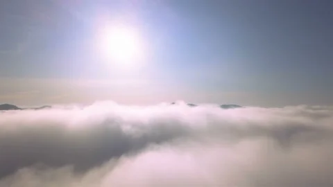4K .Aerial landscape. Fly in clouds in mountain area, sunshine Stockbeeldmateriaal 120490371