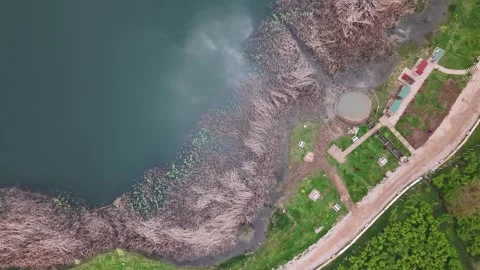 4K Aerial Left Turn Over Calm Lake with Beautiful Cloud Reflections Stock Footage 335786416