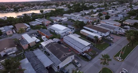 4K Aerial looking down on Trailer Park in Anywhere USA during Sunset Stock Footage 93727618