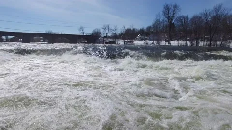 4k aerial low over rapids in winter Stock Footage 62940202