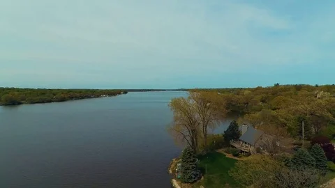 4K Aerial Low Pass Over Tree and Water Wonder Lake Illinois Video stock 75708380