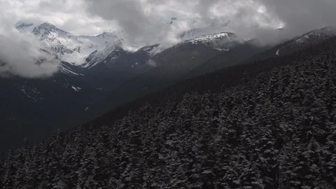 4K Aerial of Mist Dramatically Rising in Mountain Valley Stock Footage 111967183