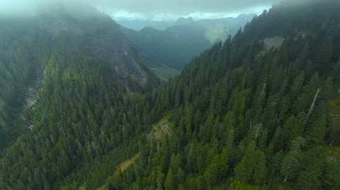 4K aerial nature flythrough of beautiful mountains Stock Footage
