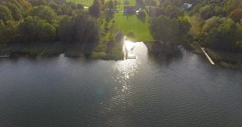 4K Aerial nature landscape fields lakes forests houses cottages Video stock 106554866