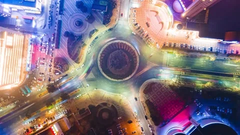 4K Aerial Night Hyper-lapse of Busy City Roundabout with Light Streaks Stock Footage 327408171