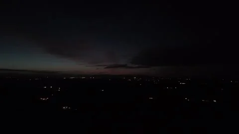 4K Aerial Night View of Distant City Lights and Dark Horizon Stockbeeldmateriaal 333706936