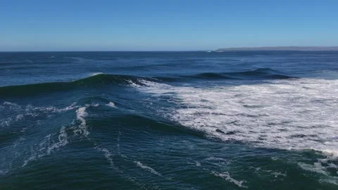 4K Aerial Ocean Wave Breaking Near Coastal Shoreline Stock Footage 333704038