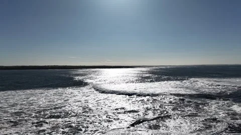 4K Aerial Ocean Waves With Sun Reflection Stockbeeldmateriaal 333703890