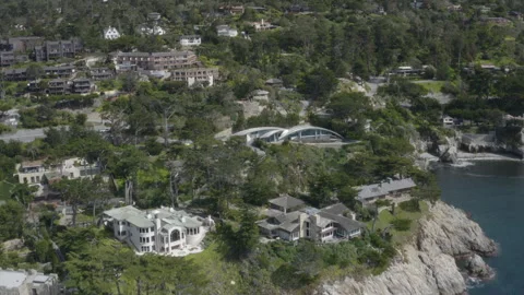 4K aerial over ocean front mansions of the Carmel Highlands California. Stock Footage 289197843