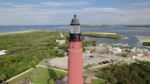 4K Aerial Push In, Rotate, Pull Out of Ponce Inlet Lighthouse on Florida Coast Stock-Footage 285443413