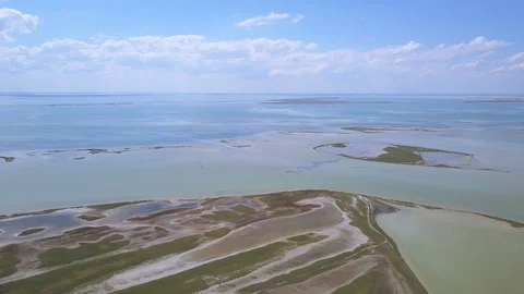 4K  Aerial. Quick fly   over  sea,  lake with islands coastline Stock-Footage 91814710