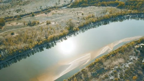           4K  Aerial. River with sun reflection and fields. Landscape.  스톡 동영상 129823374