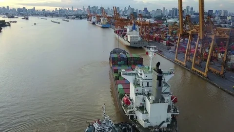 4K Aerial shot of cargo ship in port Stock Footage