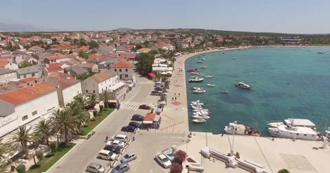 4K aerial shot DJI phantom 3 above dock and town at holiday at summer Stock Footage 54118618