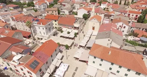 4K aerial shot DJI phantom 3 above city at summer with Church Stock Footage 54118889