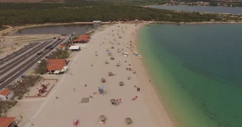 4K aerial shot DJI phantom 3 above beach at holiday at summer Stock Footage 54119311
