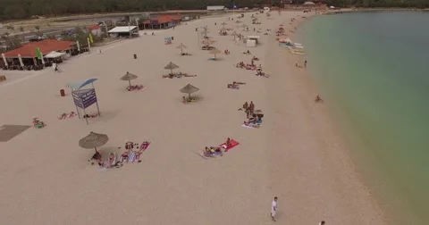 4K aerial shot DJI phantom 3 above beach at holiday at summer Stock Footage 54119444