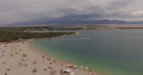 4K aerial shot DJI phantom 3 above beach at holiday at summer Stock Footage 54119539