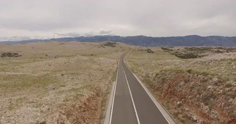 4K aerial shot DJI phantom 3 above an empty road, freeway by traveling Stock Footage 54119926