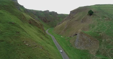 4K Aerial Shot passing Through Fresh Green British Mountains and Land.  Stock Footage 94979516