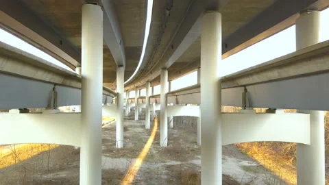 4K  Aerial. Slow flight under unfinished road. Industrial team 库存影片 106044784