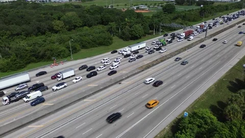 4K Aerial Static Drone Hover Miami Suburb Highway Traffic Jam Stock Footage 343876280