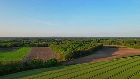 4K Aerial Sunset Flight Over Endless Meadows with Stunning Views Stock Footage 245441399