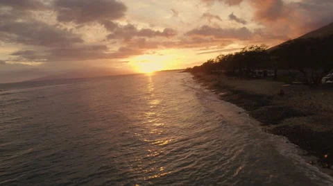 4K Aerial Sunset: Flying Down The Hawaiian Islands Coast line @ Sunset Stock Footage 65784409
