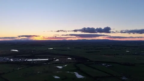 4K Aerial Sunset Hyperlapse Over Rural Fields Видео 333708057