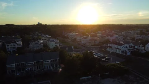 4K Aerial Sunset Over Beach Town Stock Footage 240129454