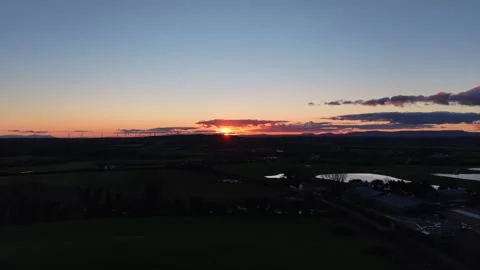 4K Aerial Sunset Over Rural Fields and Horizon Stock Footage 333708053