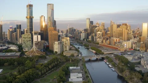4K aerial sweeping of Melbourne CBD at dawn Stock Footage