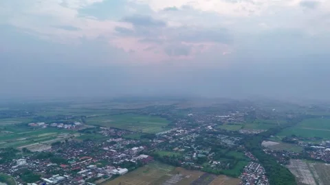 4K Aerial Tilt Down View Over Bantaran's Park near the Madiun River Stock Footage 274944129
