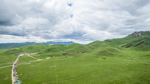 4K Aerial Time-lapse of Alpine Grassland and Mountain Meadow Natural Scenery Stock Footage 338363753
