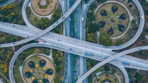 4K Aerial Time-lapse of Traffic Flow at Urban Interchange Stock Footage 341788322