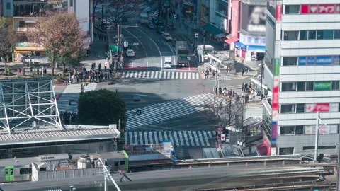 4K Aerial time lapse view over Shibuya crossing, blurred logos Stock Footage 149032381