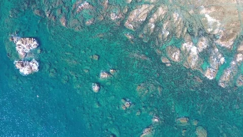 4K aerial top down still high ocean rocky coastline view with drone Stock Footage 257791330